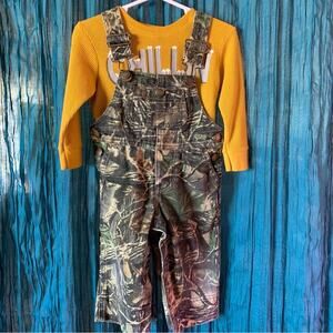 Cabela Camo Overalls Kid Size 12 months paired with Thermal long sleeve